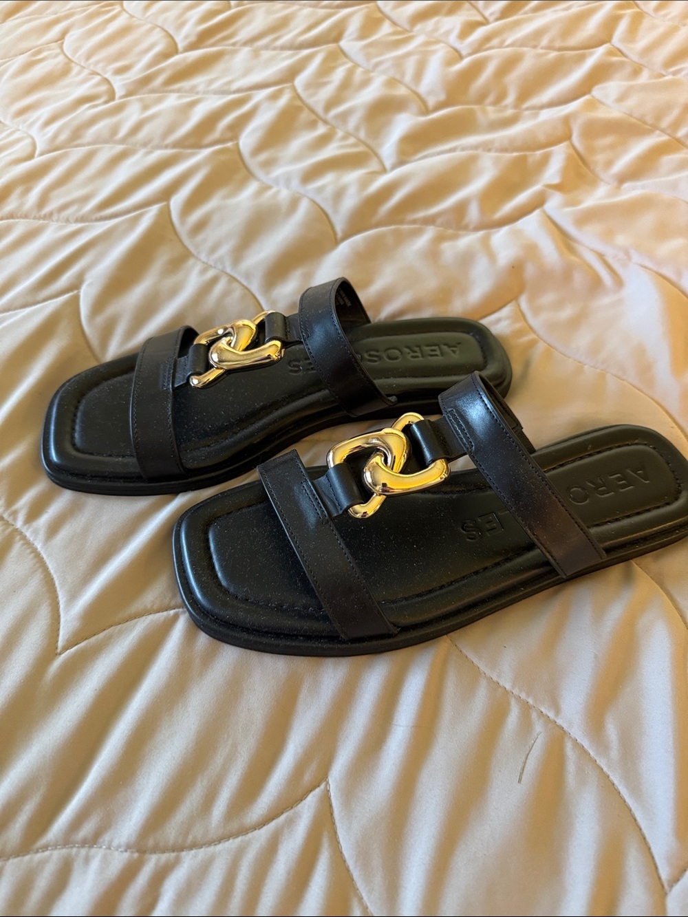 AEROSOLES Black Slide Sandals with Gold Chain Detail